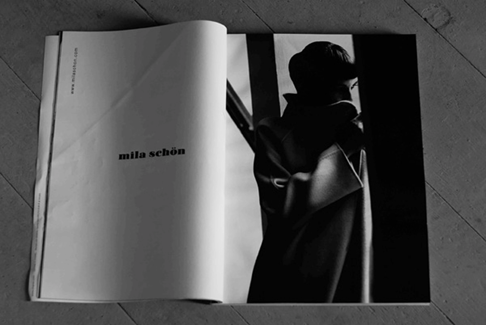 Mila Schon — magazine editorial spread on wooden floor